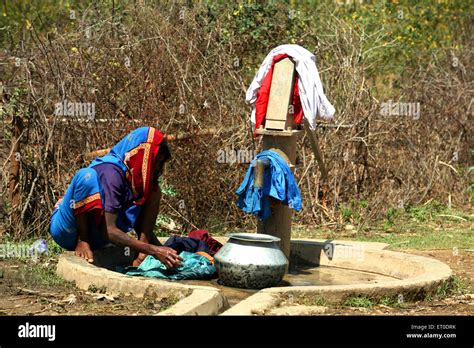 Indian Woman Washing Clothes By Hand Hi Res Stock Photography And