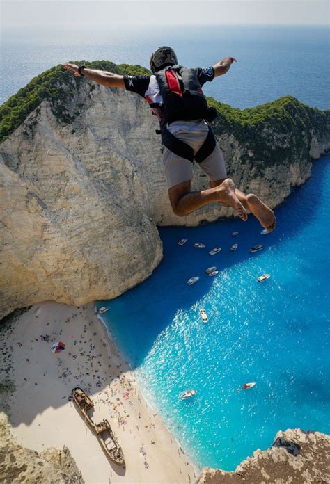 Base Jumpers Leap Towards Beautiful Crystal Clear Waters Of Immaculate