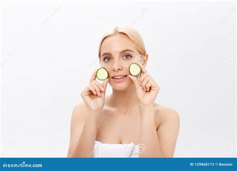 Beautiful Woman Holding Slices Of Cucumber In Front Of Her Eyes Stock Image Image Of