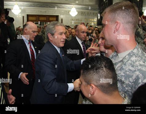 President George W Bush Pauses To Thank Soldiers Individually At