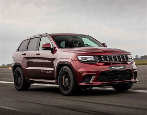 Watch The Jeep Grand Cherokee Trackhawk Drag Race And Smash Two Iconic