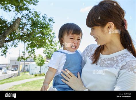 Japanese Mother And Son At The Park Stock Photo Alamy