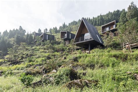 Check spelling or type a new query. Triangular hotel cabins are scattered in a green village ...