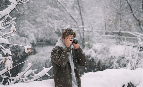 Man Taking Photo With Camera In Winter · Free Stock Photo