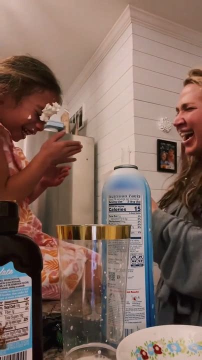 Mother Trying Out Trick With Daughter Ends Up Spitting Whipped Cream On