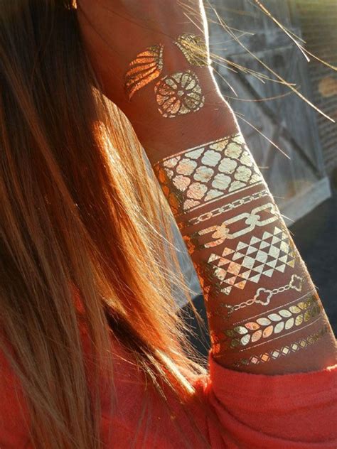 These Unashamedly Golden Arm Cuffs Community Post 24 Metallic Tattoos That Will Give You