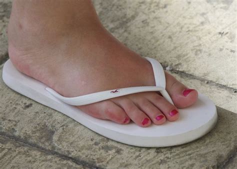 Red Toenails And White Flip Flops Pink Glossy Toes In White Flip Flop