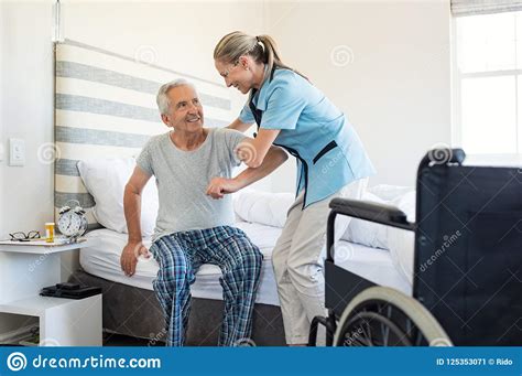 Nurse Helping Old Patient Get Up Stock Image Image Of Nurse Nursing 125353071