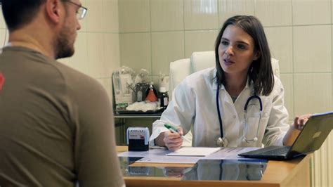Female Doctor Talking Bad News To Patient In Stock Footage Sbv