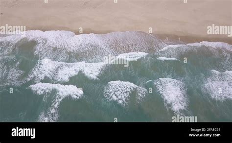 Ocean Waves Rolling Onto A Beach Stock Videos And Footage Hd And 4k