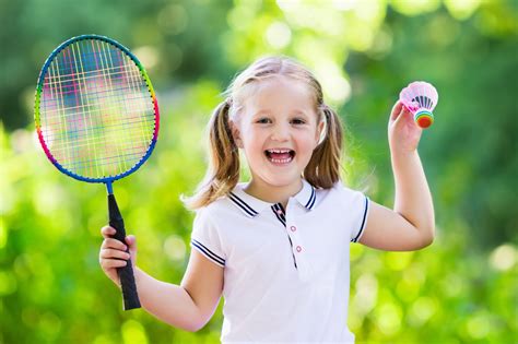 Child Playing Badminton Or Tennis Outdoor In Summer Careers In Sport