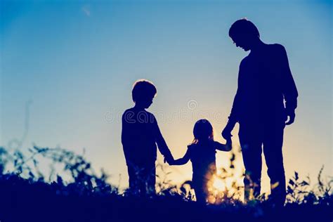 father with son and daughter walk at sunset stock image image of brother father 79529143