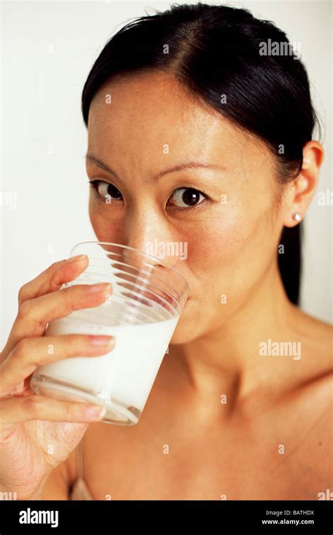 Woman Drinking Milk Milk Is A Good Source Of Dietary Calcium Stock