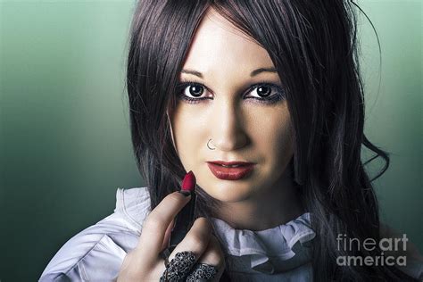 Beautiful Alternative Woman Applying Lipstick Photograph By Jorgo