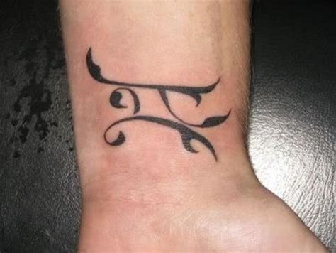 Elegant Zodiac Sign Wrist Tattoos