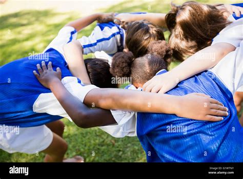 Overhead View Of Soccer Team Forming Huddle Stock Photo Alamy