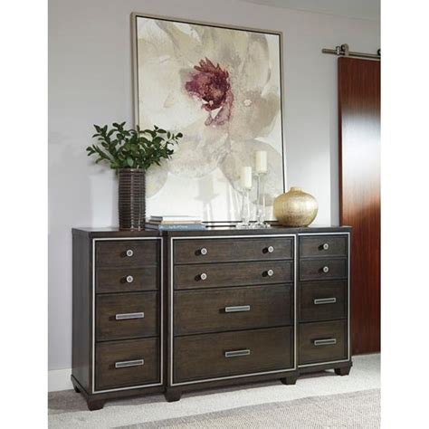 Pierced back design incorporates a lovely sense of flow. Zimbroni Ashley Furniture