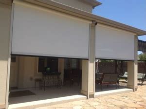 A traditional roll down outdoor blind operated by a crank handle. Houston Outdoor Shades, Roll Up or Down Shades, Roll Away ...