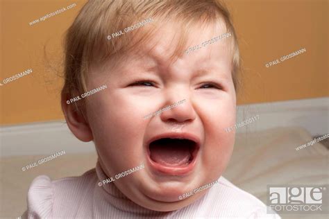 Portrait Of Baby Girl Crying Stock Photo Picture And Royalty Free