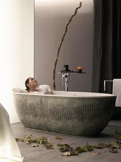 That means that specialists recommend the use of small bathtubs or even their replacement with shower cabins. Contemporary freestanding bathtub ideas with elegant design