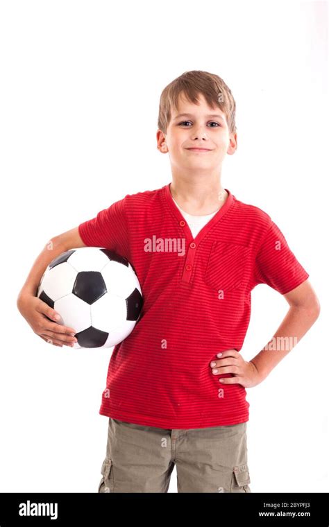 Cute Boy Is Holding A Football Ball Soccer Ball Stock Photo Alamy