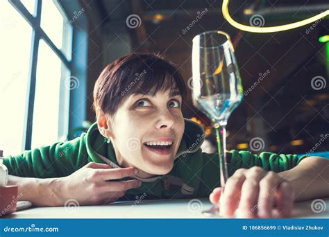 A Drunk Woman Is Sitting At A Table Stock Image Image Of Frustration