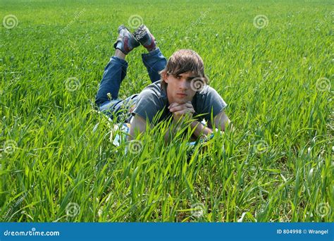 Young Man At The Green Grass Stock Photo Image Of Grass Lifestyle