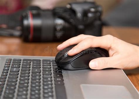 Photographer Working With A Mouse On A Laptop Stock Image Image Of