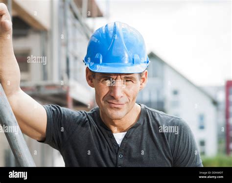 Builder On Construction Site Portrait Stock Photo Alamy