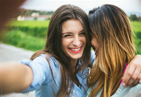 View Young Women Taking A Selfie With The Phone By Stocksy Contributor Simone Wave Stocksy