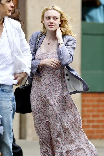 Dakota Fanning Arrives At Her Hotel Without Makeup On Wearing A