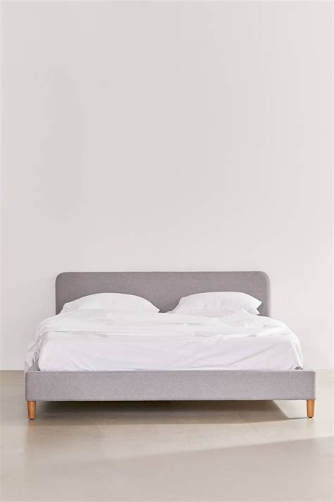Riley Platform Bed | Urban Outfitters | Platform bed, Upholstered platform bed, Platform bed frame