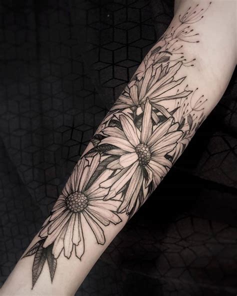 Sketch Work Daisy Tattoo On The Arm