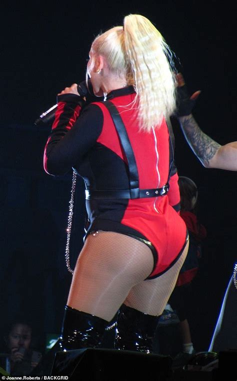 Christina Aguilera Displays Her Curves In A Bondage Inspired Bodysuit