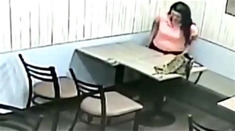Desperate Girl Caught On Cctv Pissing Under A Table Thisvid Com