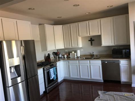 As you finish each section, go back over the paint with a fine bristle. Paint Over the Cherry Cabinets in Your Home - Love Your ...