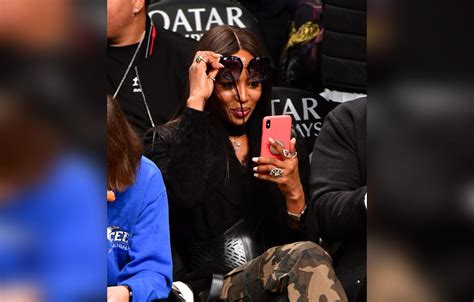 Naomi Campbell Takes Selfies With Steve Stoute At A Basketball Game