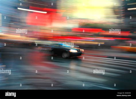 Motion Blur Of A Car Racing Through Conjested City Traffic In New York