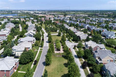 Aerial View Of A Neighborhood In Suburban Chicago With Homes On Either