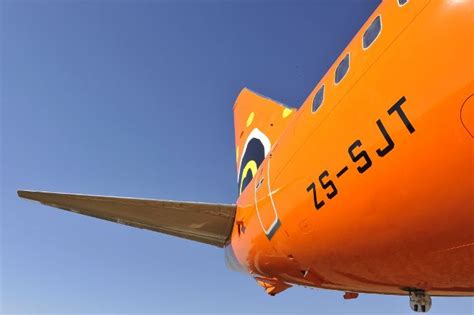 Looking for a cheap holiday or a last minute weekend deal? Tailfin of a Mango Airlines Boeing 737-800 | Mango ...
