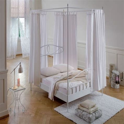 Canopy beds are beautiful home furnishings that look solid and soft at the same time this canopy bed is bursting with details, starting with the triple arch jhulla style headboard commonly found in traditional indian swings. Romantic Canopy Bed Ideas | Canopy bed frame, Iron canopy ...