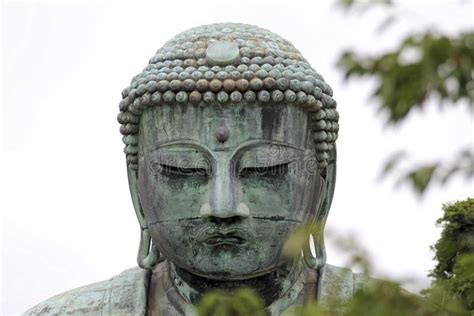 Monumental Bronze Statue Of The Great Buddha In Kamakura Stock Photo