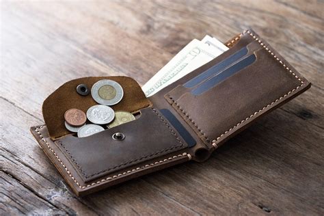 While a billfold has just two flaps that you press together along a central line, a trifold has three. Leather Coin Pocket Wallet - JooJoobs