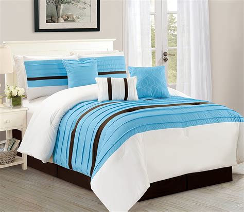 The set includes one reversible comforter and one sham for the twin set or two shams for the full/queen or king sets. Serene Stripe Queen Size 7-Piece Elegant Comforter Bedding ...
