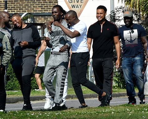 prisoner is met by entourage after being released from jail before hopping into a rolls royce