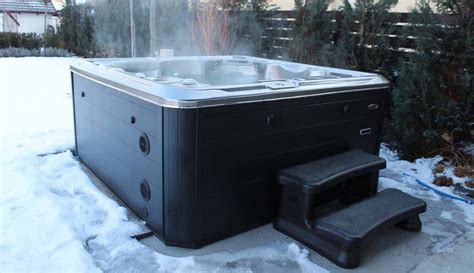 Hot Tub Fun On A Rainy Or Snowy Day What You Need To Know Beninati Pools