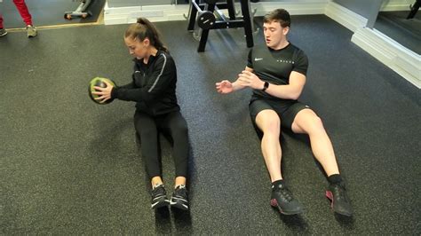 How To Do Medicine Ball Russian Twist Throw With Partner Exercise