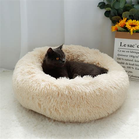 Crafted with premium nylon fabric and finished with a luxurious faux fur exterior. New Hot Best Selling Fluffy Calming Dog Bed Long Plush ...