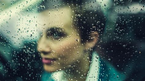 Wallpaper Id A Womans Face Seen Through A Rain Streaked