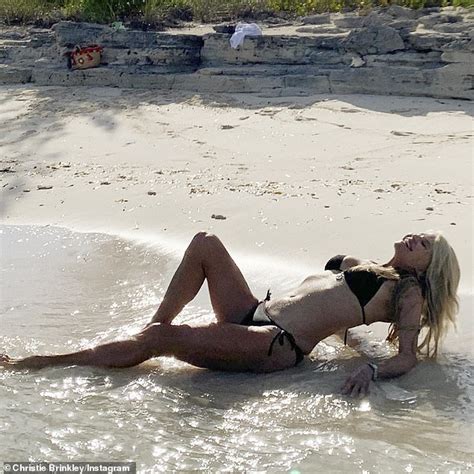 christie brinkley 65 sizzles in string bikini as she catches rays during island getaway